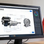 ecran d ordinateur affichant moteur chinois devant drapeau chinois